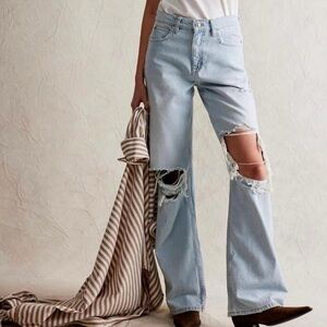 Levi’s 501’s ripped denim straight vintage jeans light wash raw hemline pants